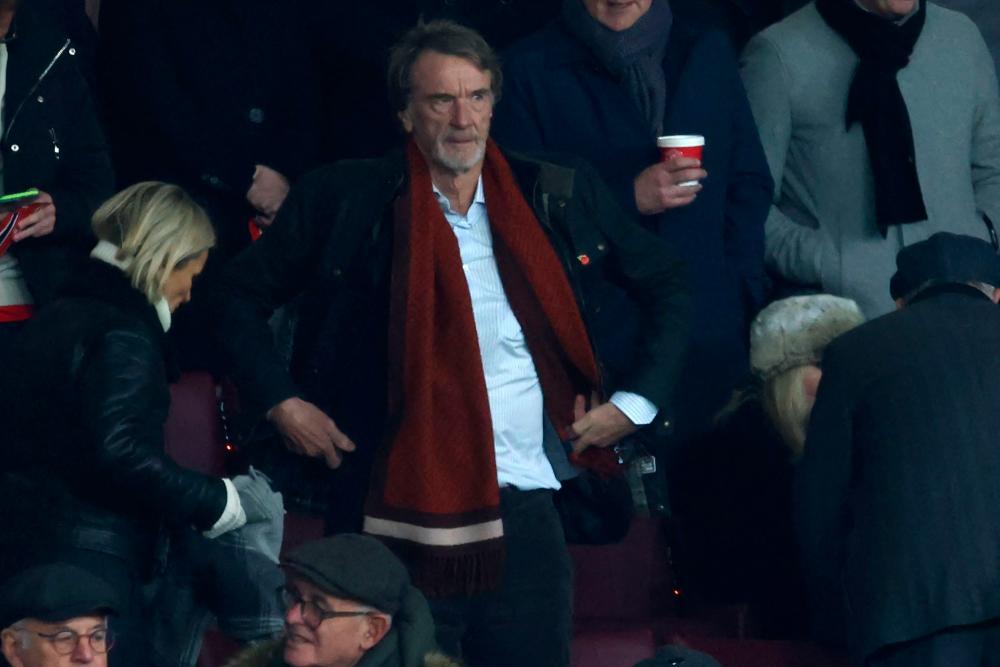 Manchester United’s prospective co-owner Jim Ratcliffe (C) takes his seat for the English Premier League football match between Manchester United and Tottenham Hotspur at Old Trafford in Manchester, north west England, on January 14, 2024/AFPPix