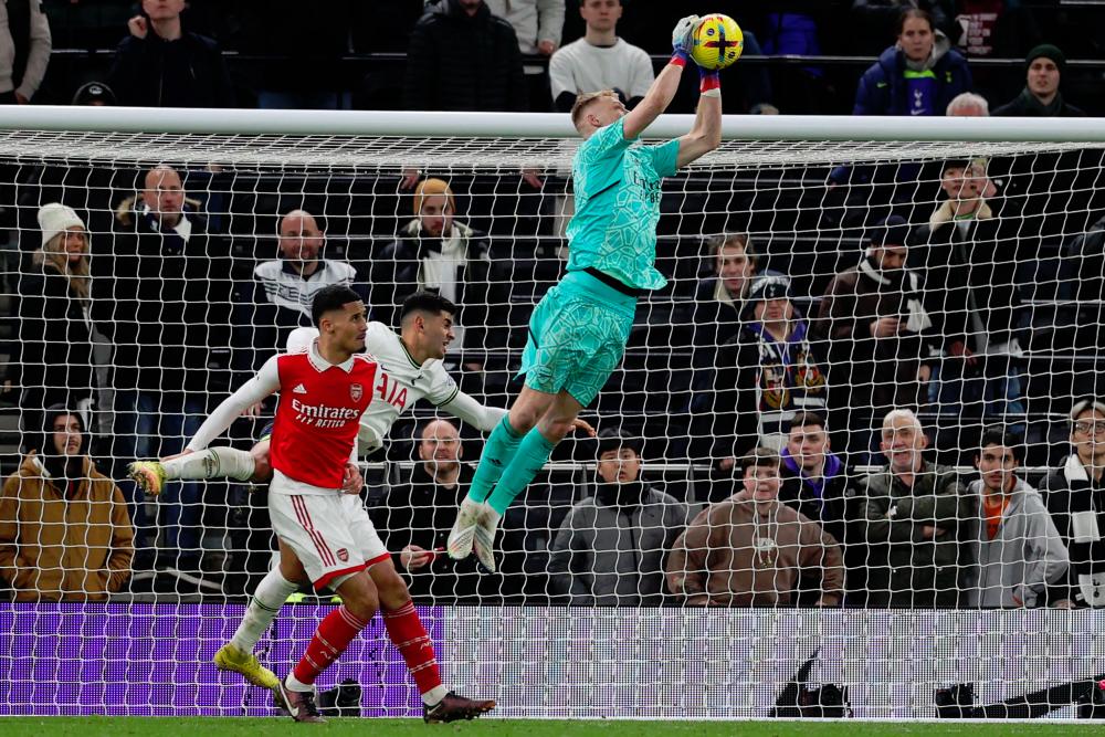 Arsenal's goalkeeper Aaron Ramsdale catches the ball during the English Premier League football match between Tottenham and Arsenal/AFPPIX