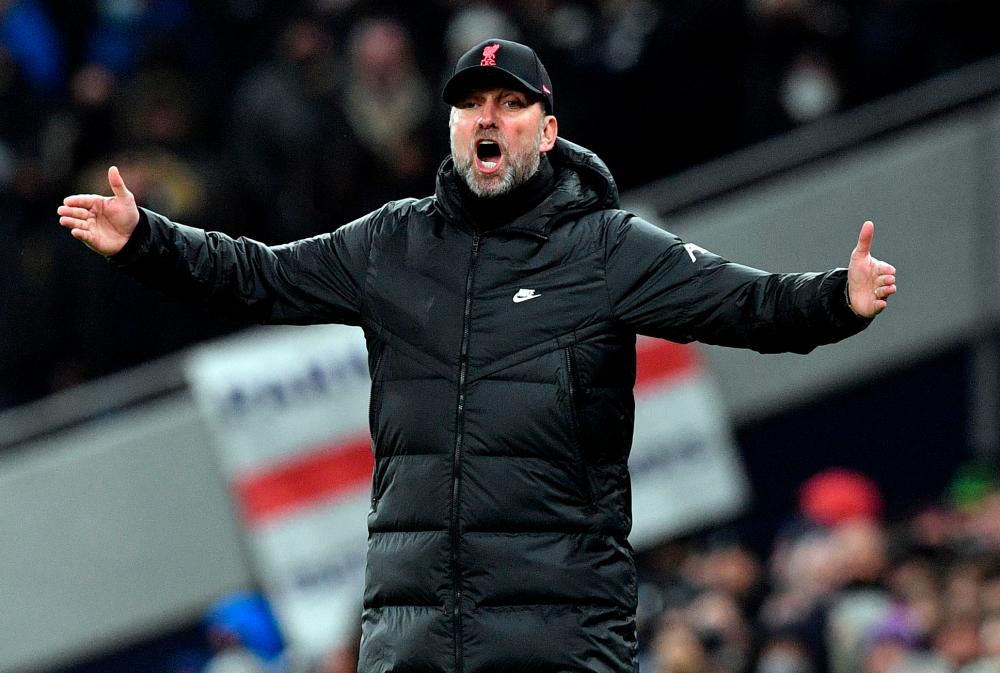 Liverpool's German manager Jurgen Klopp reacts during the English Premier League football match between Tottenham Hotspur and Liverpool at Tottenham Hotspur Stadium in London, on December 19, 2021. AFPPIX