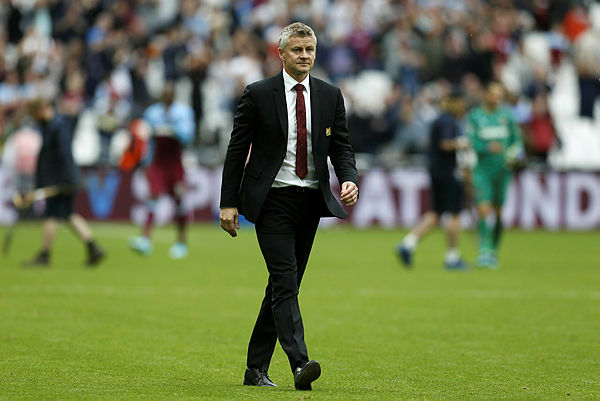 Manchester United’s Norwegian manager Ole Gunnar Solskjaer gestures at the final whistle during the English Premier League football match between West Ham United and Manchester United at The London Stadium on Sept 22. — AFP