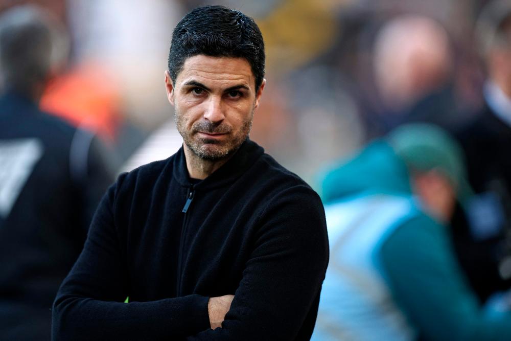 Arsenal’s Spanish manager Mikel Arteta looks on ahead of kick-off in the English Premier League football match between Wolverhampton Wanderers and Arsenal at the Molineux stadium in Wolverhampton, central England on April 20, 2024/AFPPix