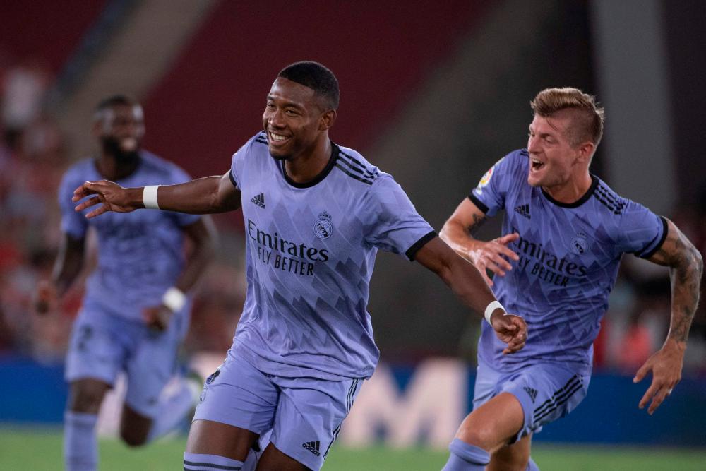 Real Madrid’s Austrian defender David Alaba celebrates scoring this team’s second goal during the Spanish league football match between UD Almeria and Real Madrid CF at the Municipal Stadium of the Mediterranean Games in Almeria on August 14, 2022. AFPPIX