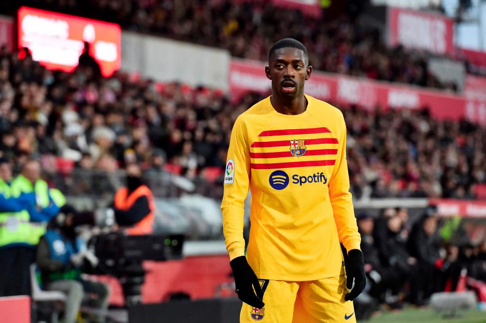 Barcelona's French forward Ousmane Dembele reacts during the Spanish League football match between Girona FC and FC Barcelona at the Montilivi stadium in Girona on January 28, 2023. - AFPPIX