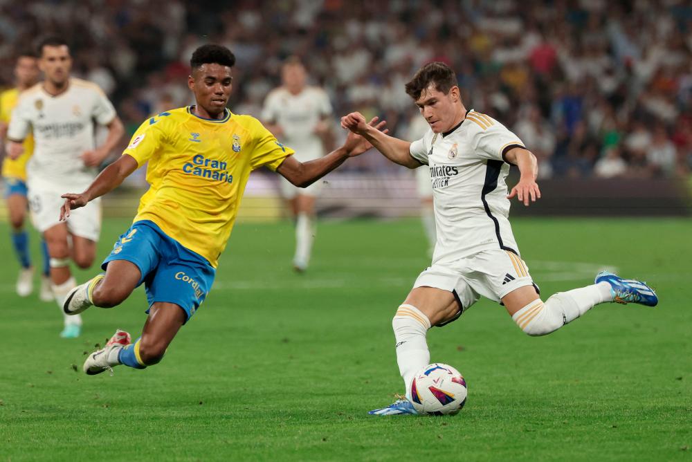Real Madrid’s Spanish defender #20 Fran Garcia kicks the ball during the Spanish league football match between Real Madrid CF and UD Las Palmas at the Santiago Bernabeu stadium in Madrid on September 27, 2023/AFPPix