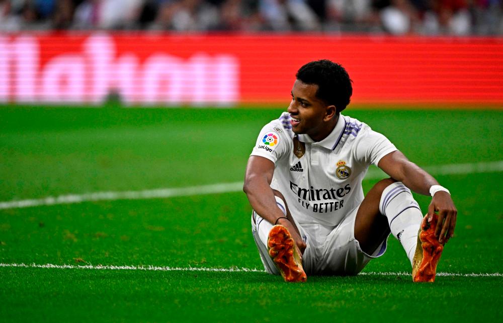 Real Madrid’s Brazilian forward Rodrygo reacts on the ground during the Spanish league football match between Real Madrid CF and Rayo Vallecano de Madrid at the Santiago Bernabeu stadium in Madrid on May 24, 2023/AFPPix