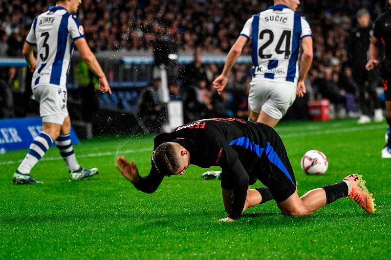 Barcelona's Spanish midfielder #16 Fermin Lopez gestures during the Spanish league football match between Real Sociedad and FC Barcelona at the Anoeta stadium in San Sebastian on November 10, 2024. - ANDER GILLENEA / AFPpix