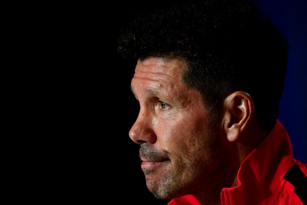 Atletico Madrid’s Argentinian coach Diego Simeone gives a press conference at the Wanda Metropolitano stadium in Madrid on September 17, 2019 on the eve of the UEFA Champions League Group D football match against Juventus. — AFP