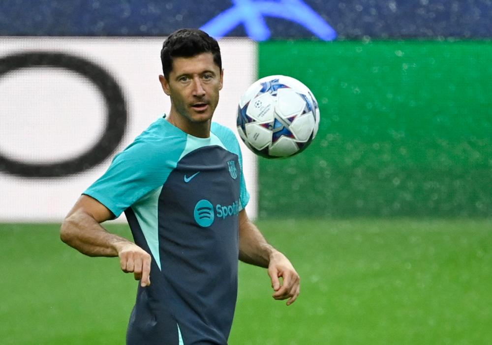 Barcelona’s Polish forward #09 Robert Lewandowski attends a training session at the Dragao stadium in Porto, on October 3, 2023, on the eve of the UEFA Champions League 1st round day 2 group H football match between FC Porto and FC Barcelona/AFPpix