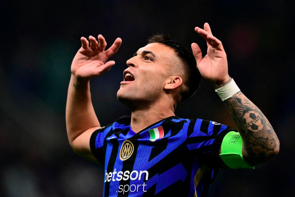 Inter Milan's Argentine forward #10 Lautaro Martinez celebrates after Inter Milan won the UEFA Champions League semi-final second leg football match between Inter Milan and FC Barcelona at the San Siro stadium in Milan on May 6, 2025. -AFPpix
