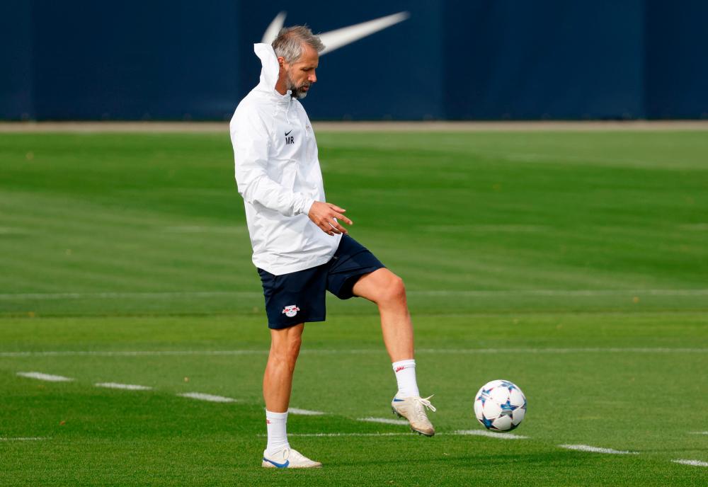 Leipzig’s German head coach Marco Rose plays the ball during a training session on the eve of the UEFA Champions League football match between RB Leipzig and Manchester City in Leipzig, on October 3, 2023/AFPPix