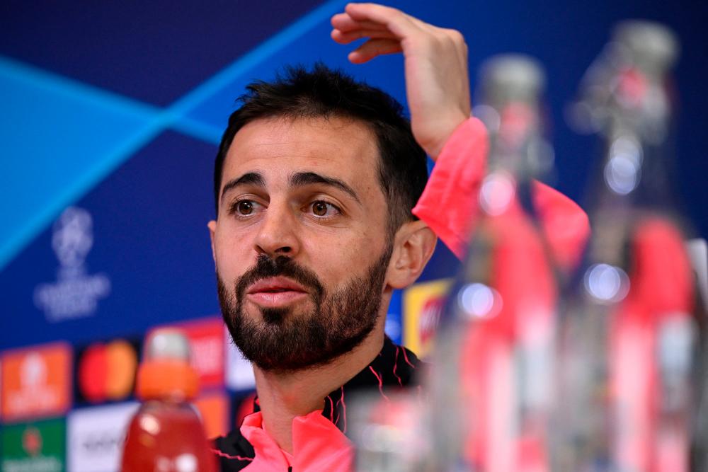 Manchester City’s Portuguese midfielder #20 Bernardo Silva attends a press conference at Manchester City’s training ground in north-west England on April 16, 2024, on the eve of their UEFA Champions League Group quarter-final second-leg football match against Real Madrid/AFPPix