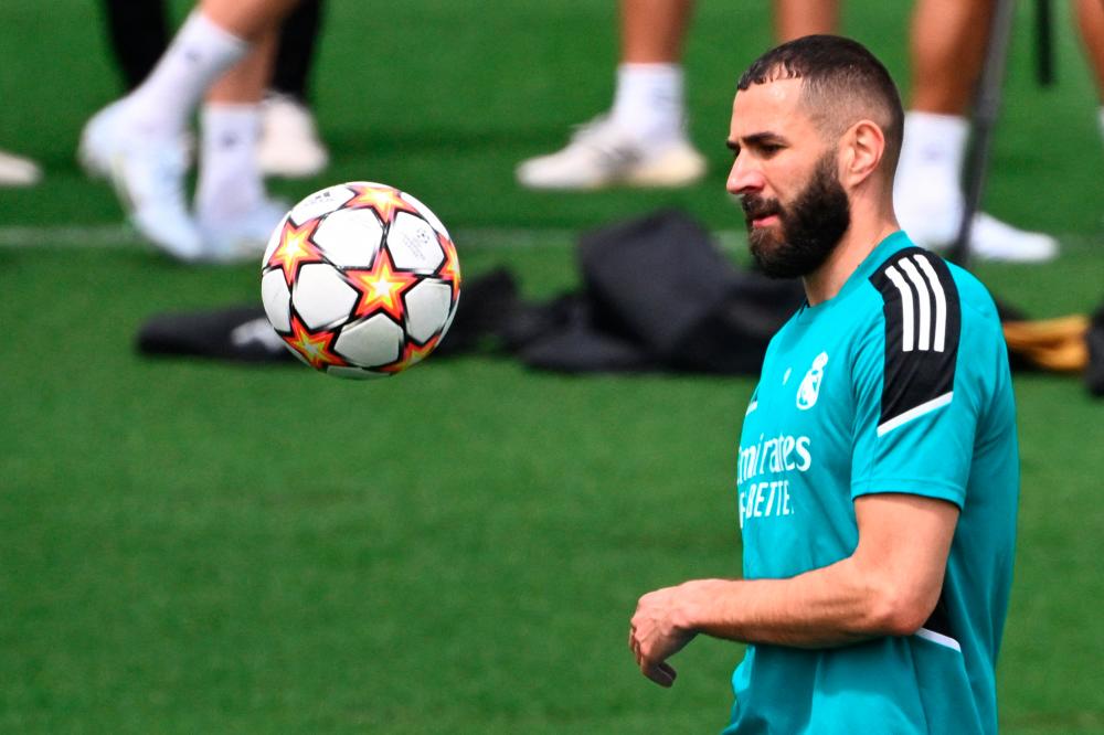 Real Madrid's French forward Karim Benzema attends a training session at the Ciudad Real Madrid in the Madrid's suburb of Valdebebas during the club's Media Day on May 24, 2022 ahead of their UEFA Champions League final match against Liverpool. AFPPIX