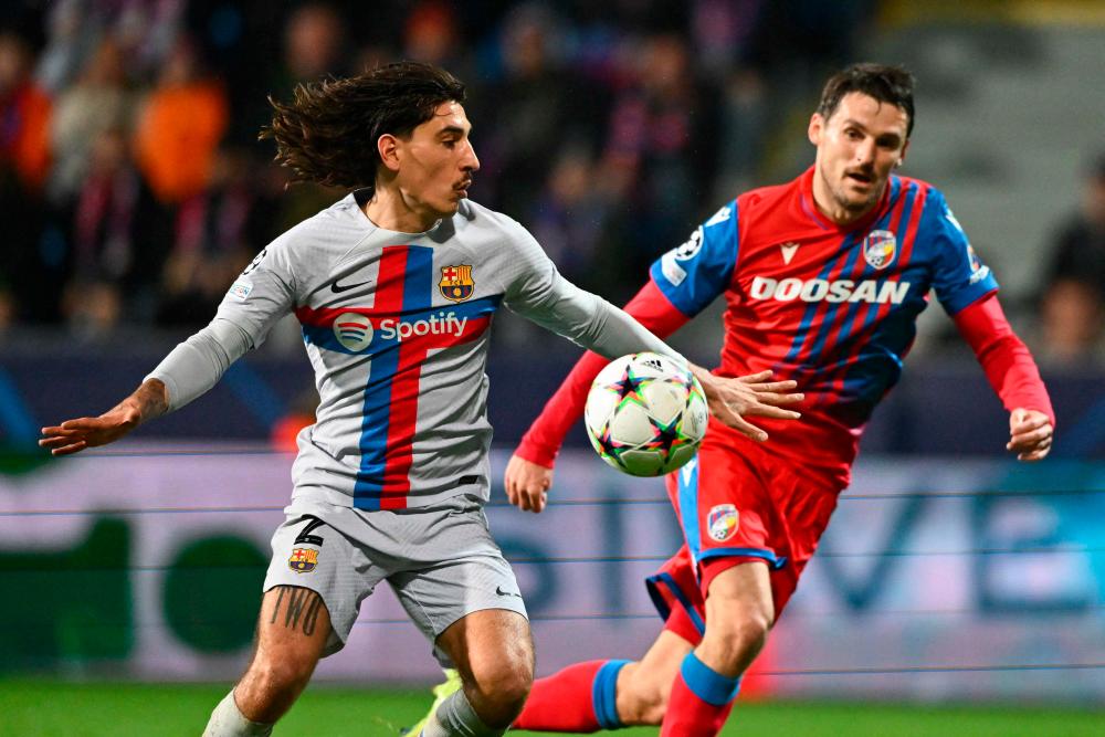 Viktoria Plzen’s Czech defender Milan Havel (R) and Barcelona’s Spanish defender Hector Bellerin vie for the ball during the UEFA Champions League Group C football match FC Viktoria Plzen v FC Barcelona in Plzen, Czech Republic, on November 1, 2022. AFPPIX