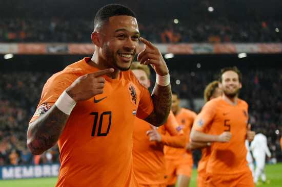 Netherlands’ forward Memphis Depay celebrates after scoring a goal during the UEFA Nations League against France at the Feijenoord stadium in Rotterdam on Nov 16, 2018. — AFP