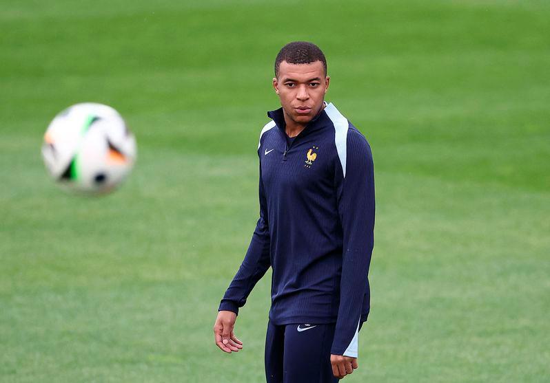 France's forward #10 Kylian Mbappe looks on during an MD-1 training session at Paul Janes Stadium in Duesseldorf on June 16, 2024, on the eve of their UEFA Euro 2024 Group D football match against Austria. (Photo by FRANCK FIFE / AFP)