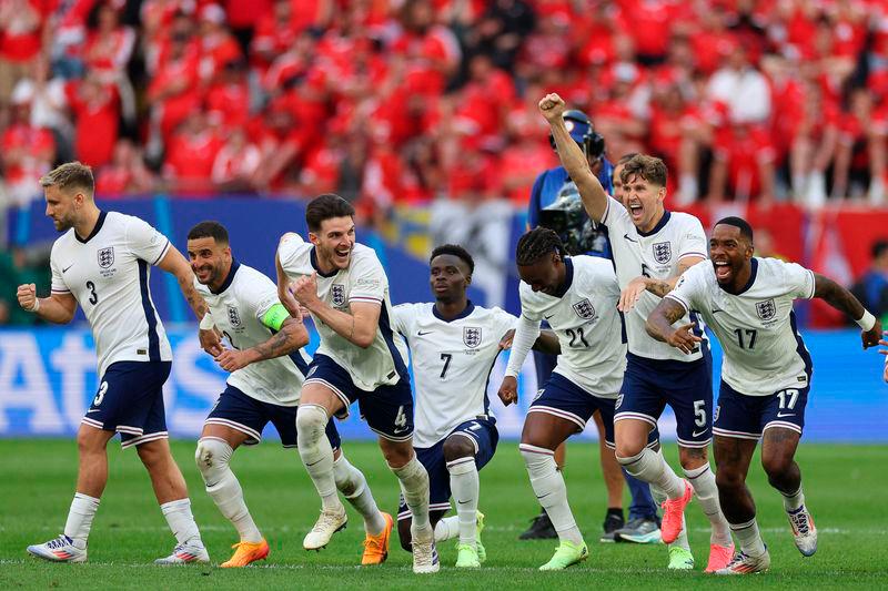 The English team celebrate at the end of the penalty shootout as they win the UEFA Euro 2024 quarter-final against Switzerland at the Duesseldorf Arena - AFPpix