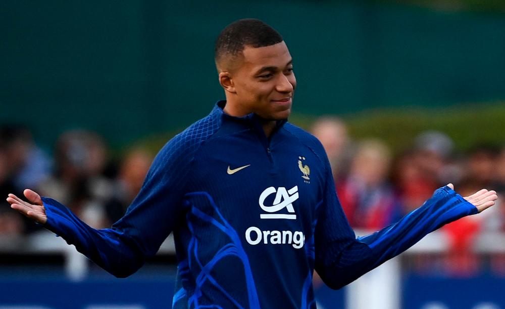Paris Saint-Germain’s French forward Kylian Mbappe gestures during a training session in Clairefontaine-en-Yvelines on September 20, 2022 as part of the team’s preparation for the upcoming UEFA Nations League. AFPPIX