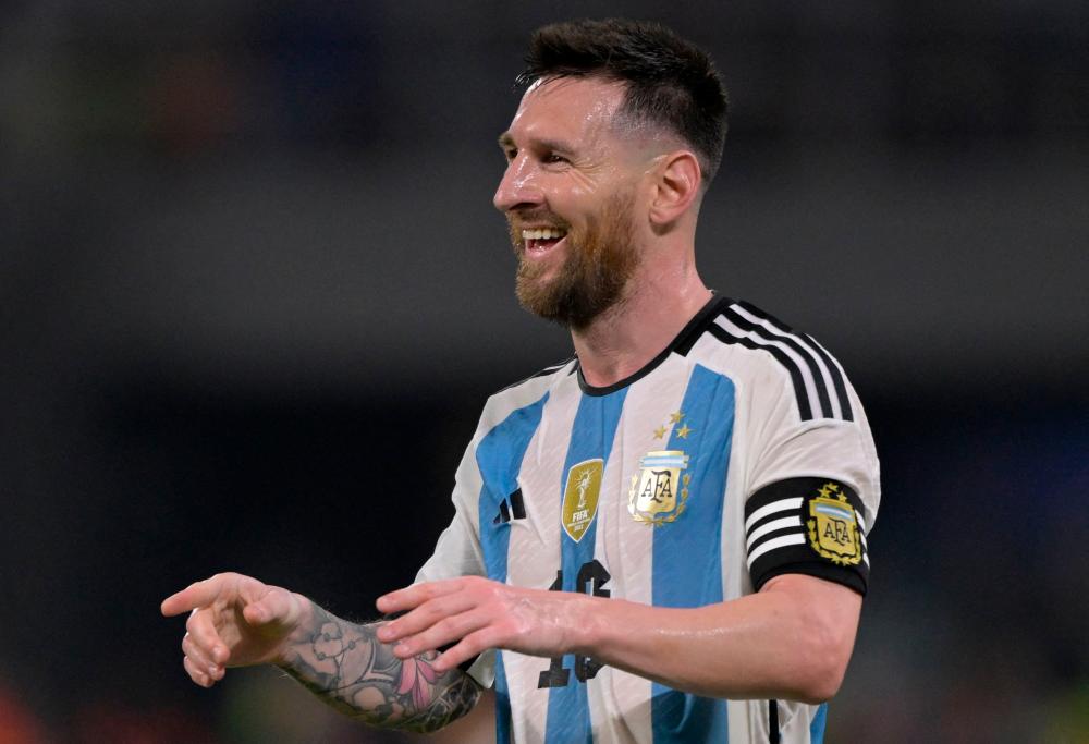Argentina's forward Lionel Messi celebrates scoring his team's third goal during the friendly football match between Argentina and Curacao at the Madre de Ciudades stadium in Santiago del Estero, in northern Argentina, on March 28, 2023/AFPPix