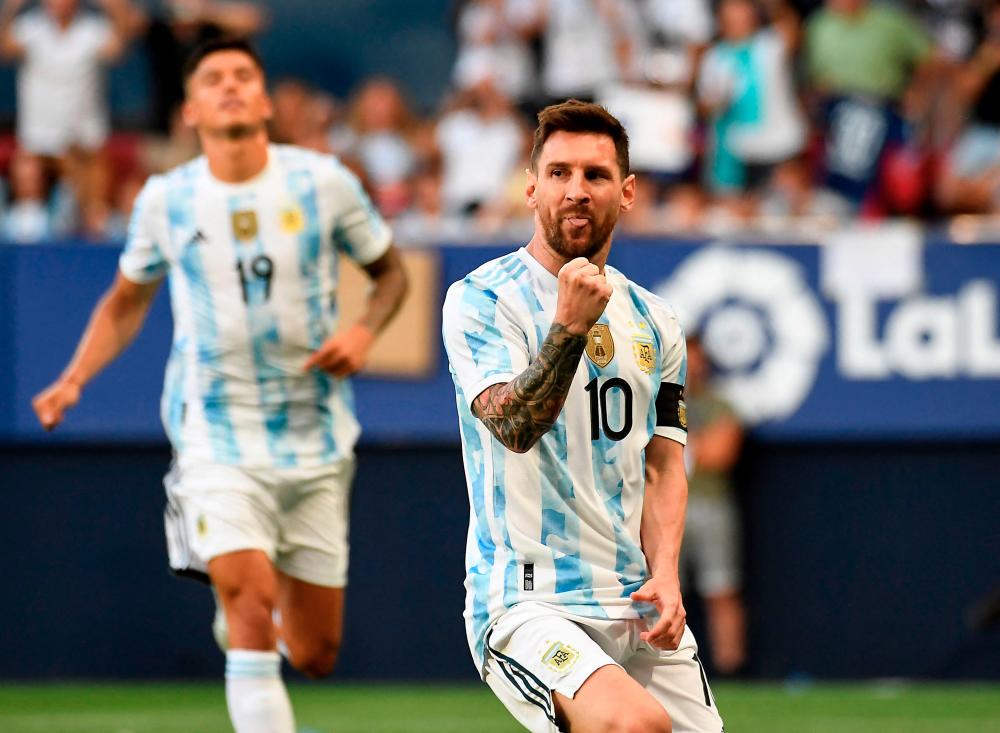 Argentina's forward Lionel Messi celebrates after scoring his team's first goal during the international friendly football match between Argentina and Estonia at El Sadar stadium in Pamplona on June 5, 2022. AFPPIX