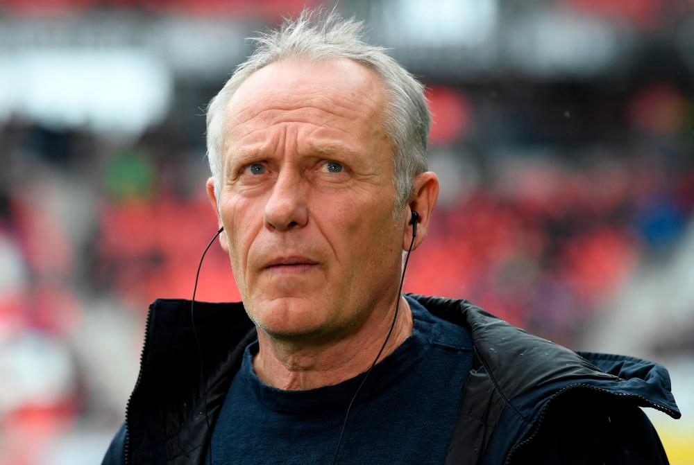 Freiburg’s German coach Christian Streich looks on prior to the German first division Bundesliga football match between SC Freiburg and Bayer 04 Leverkusen in Freiburg, southern Germany, on March 17, 2024/AFPPix