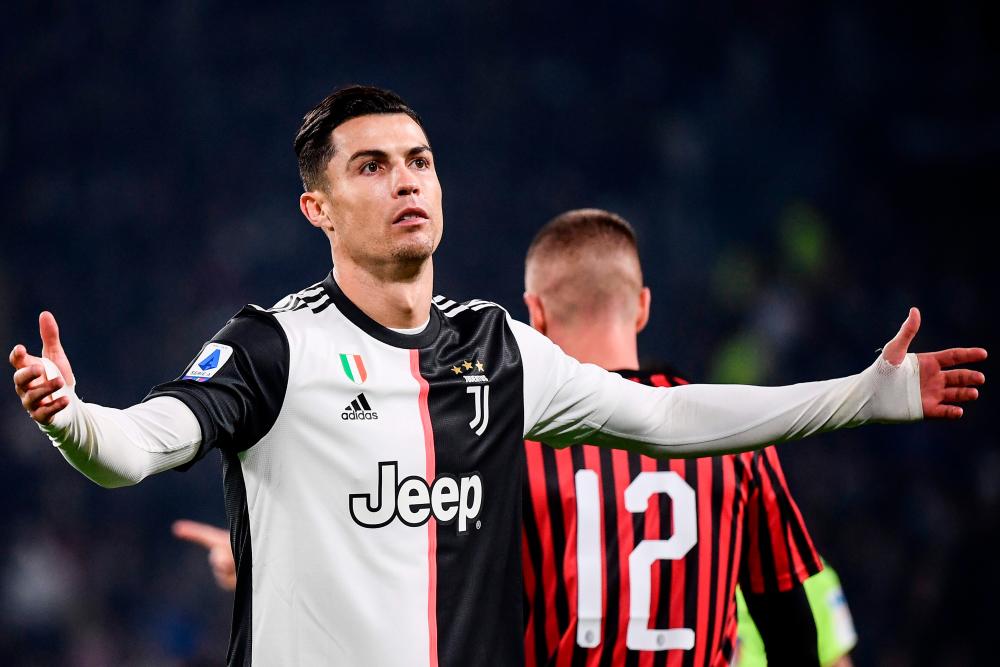 Juventus' Portuguese forward Cristiano Ronaldo reacts during the Italian Serie A football match Juventus vs AC Milan on November 10, 2019 at the Juventus Allianz stadium in Turin. - AFP