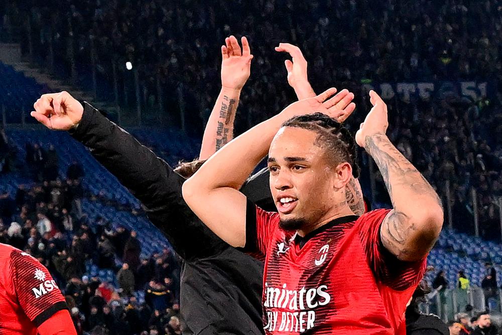 AC Milan’s Swiss forward #17 Noah Okafor celebrates with teammates at the end of the Italian Serie A fotball match between Lazio and AC Milan on March 01, 2024 at the Olympic stadium in Rome/AFPPix