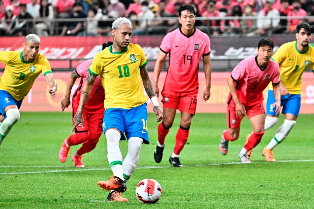 Brazil’s forward Neymar scores a penalty goal during the international football friendly match between South Korea and Brazil at Seoul World Cup Stadium in Seoul on June 2, 2022. AFPPIX
