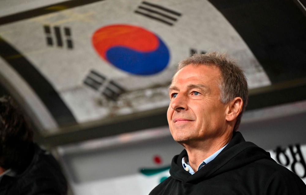 South Korea’s head coach Jurgen Klinsmann looks on before an international friendly football match between South Korea and Colombia in Ulsan on March 24, 2023/AFPPix