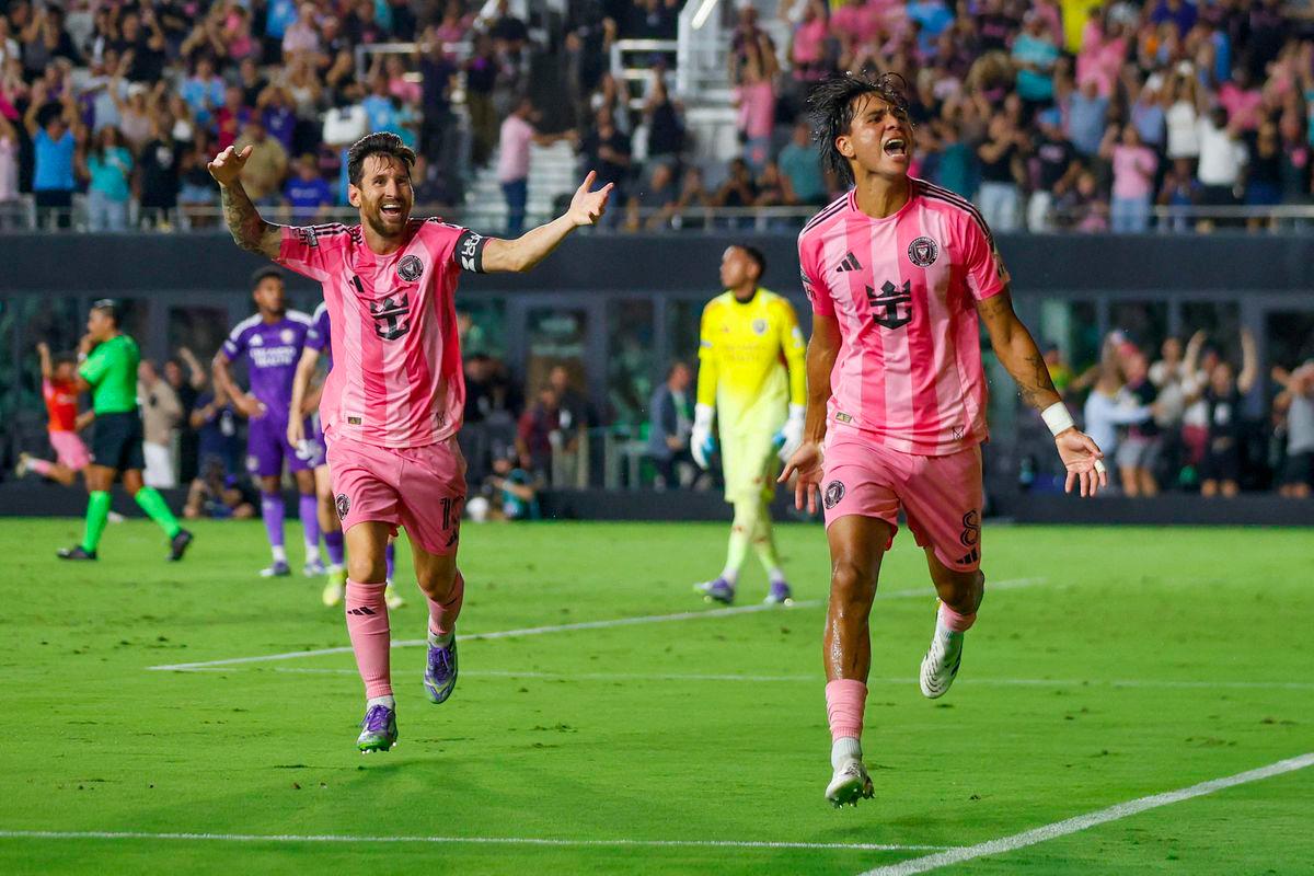 Inter Miami's Argentine forward #10 Lionel Messi and Inter Miami's Venezuelan midfielder #08 Telasco Segovia celebrate a third goal during the Leagues Cup semi-final football match between Inter Miami CF and Orlando City SC at Chase Stadium in Fort Lauderdale, Florida, on August 27, 2025. - AFPPIX