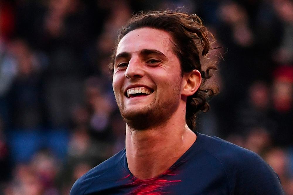 This file photo taken on Oct 20, 2018 shows Paris Saint-Germain's French midfielder Adrien Rabiot celebrating after scoring his team's second goal during the French L1 football match between Paris Saint-Germain (PSG) and Amiens at the Parc des Princes stadium in Paris. Rabiot arrived in Turin on June 30, 2019 ahead of his move to Juventus, the Italian champions have confirmed. — AFP