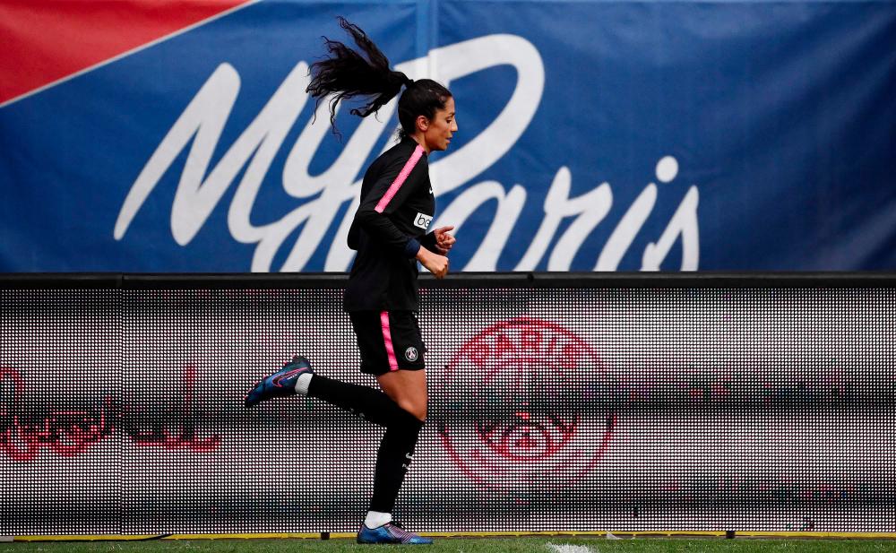 Paris Saint-Germain's Danish midfielder Nadia Nadim, a refugee from Afghanistan who has realised her dream of becoming a professional player, attends a training session at the Parc des Princes stadium in Paris on March 8, 2019. — AFP