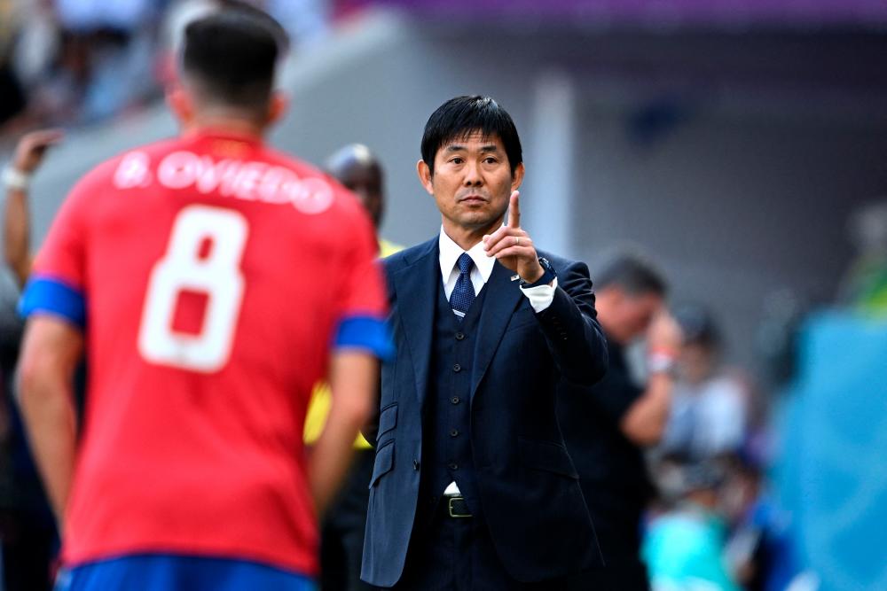 Japan’s coach #00 Hajime Moriyasu gestures on the touchline during the Qatar 2022 World Cup Group E football match between Japan and Costa Rica at the Ahmad Bin Ali Stadium in Al-Rayyan, west of Doha on November 27, 2022. AFPPIX