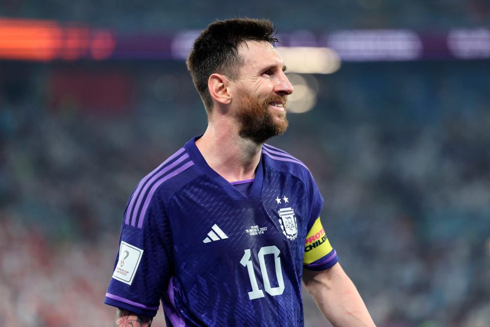 Argentina's forward #10 Lionel Messi smiles during the Qatar 2022 World Cup Group C football match between Poland and Argentina at Stadium 974 in Doha on November 30, 2022/AFPPix