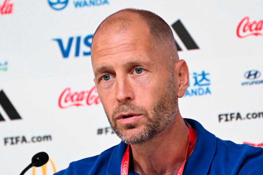 USA’s coach #00 Gregg Berhalter speaks during a press conference at the Qatar National Convention Center (QNCC) in Doha on December 2, 2022, on the eve of the Qatar 2022 World Cup football match between the Netherlands and USA/AFPPix