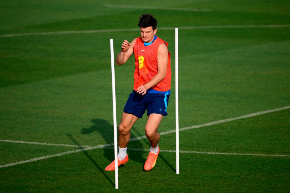 England’s defender Harry Maguire takes part in a training session at Al Wakrah SC Stadium in Al Wakrah, south of Doha, on December 1, 2022, during the Qatar 2022 World Cup football tournament. AFPPIX