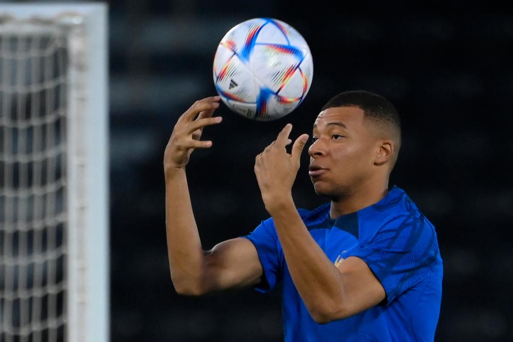 France’s forward Kylian Mbappe takes part in a training session at Al Sadd SC in Doha on November 29, 2022, on the eve of the Qatar 2022 World Cup football match between Tunisia and France/AFPPix
