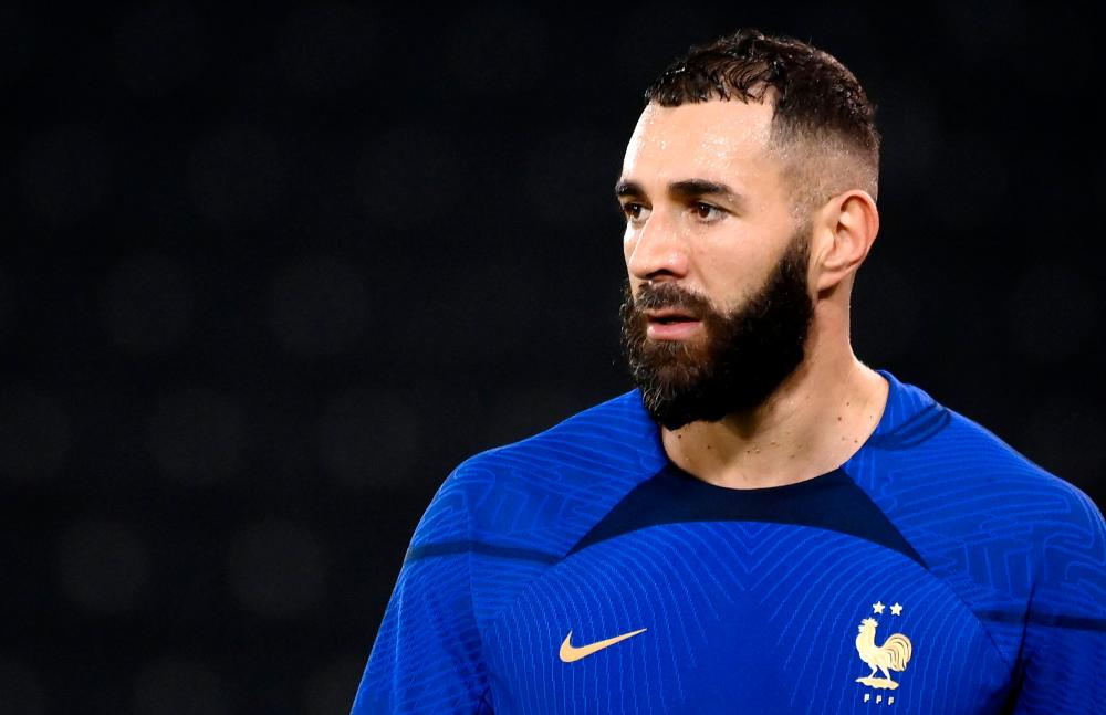 France’s forward Karim Benzema looks on during a training session at the Jassim-bin-Hamad Stadium in Doha on November 17, 2022, ahead of the Qatar 2022 World Cup football tournament/AFPPix