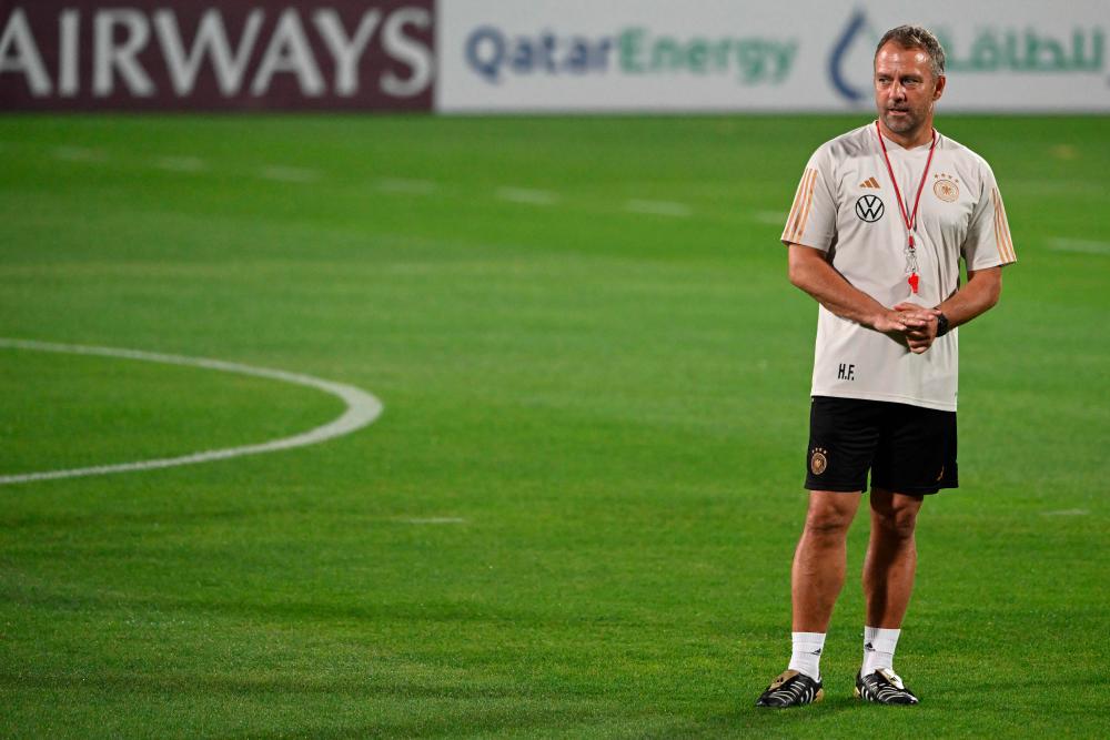Germany’s head coach Hans-Dieter Flick leads a training session of his team at the Al Shamal Stadium in Al Shamal, north of Doha on November 29, 2022, during the Qatar 2022 World Cup football tournament/AFPPix