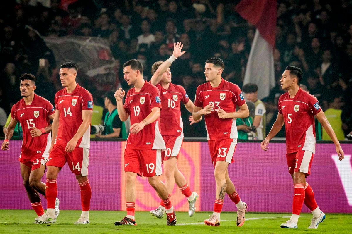Indonesia’s forward #10 Ole Lennard Romenij waves to supporters after scoring his team’s first goal during the FIFA World Cup 2026 Asian qualifier football match between Indonesia and China at Gelora Bung Karno Stadium in Jakarta on June 5, 2025. AFP
