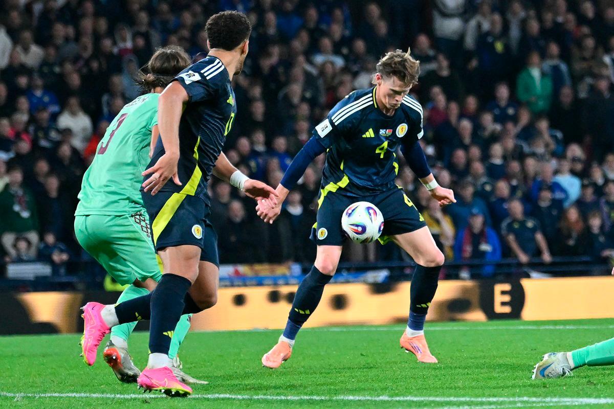 Scotland’s midfielder #04 Scott McTominay (C) controls the ball before scoring their second goal during the 2026 World Cup Group C qualifier football match between Scotland and Belarus. - ANDY BUCHANAN / AFP
