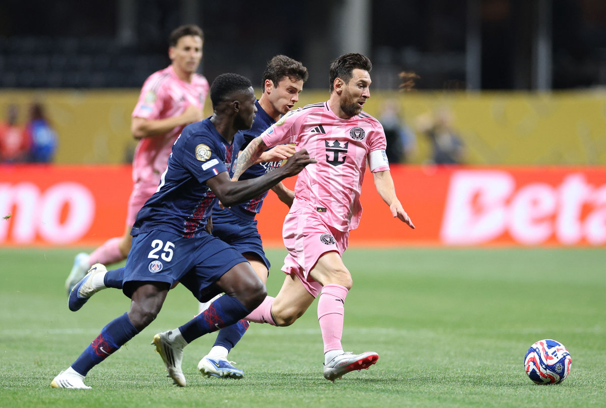 Inter Miami’s Argentine forward #10 Lionel Messi, Paris Saint-Germain’s Portuguese defender #25 Nuno Mendes and Portuguese midfielder #87 Joao Pedro Goncalves Neves fight for the ball during the FIFA Club World Cup 2025 round of 16 football match between France’s Paris Saint-Germain and US Inter Miami at the Mercedes-Benz Stadium in Atlanta on June 29, 2025. - AFP