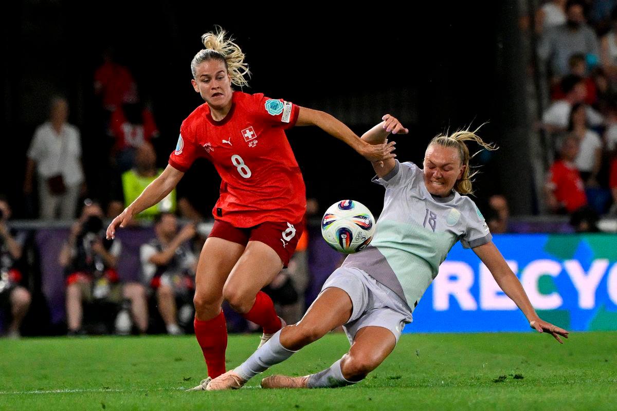 Switzerland’s defender #08 Nadine Riesen and Norway’s midfielder #18 Frida Maanum fight for the ball during the UEFA Women’s Euro 2025 Group A football match between Switzerland and Norway at the St Jakob-Park Stadium in Basel on July 2, 2025