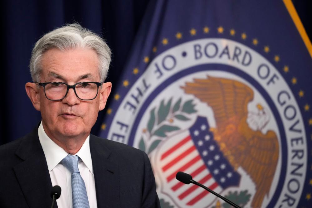 Powell speaking at a news conference after a meeting of the Federal Open Market Committee at the Federal Reserve headquarters in Washington yesterday. – AFPpix