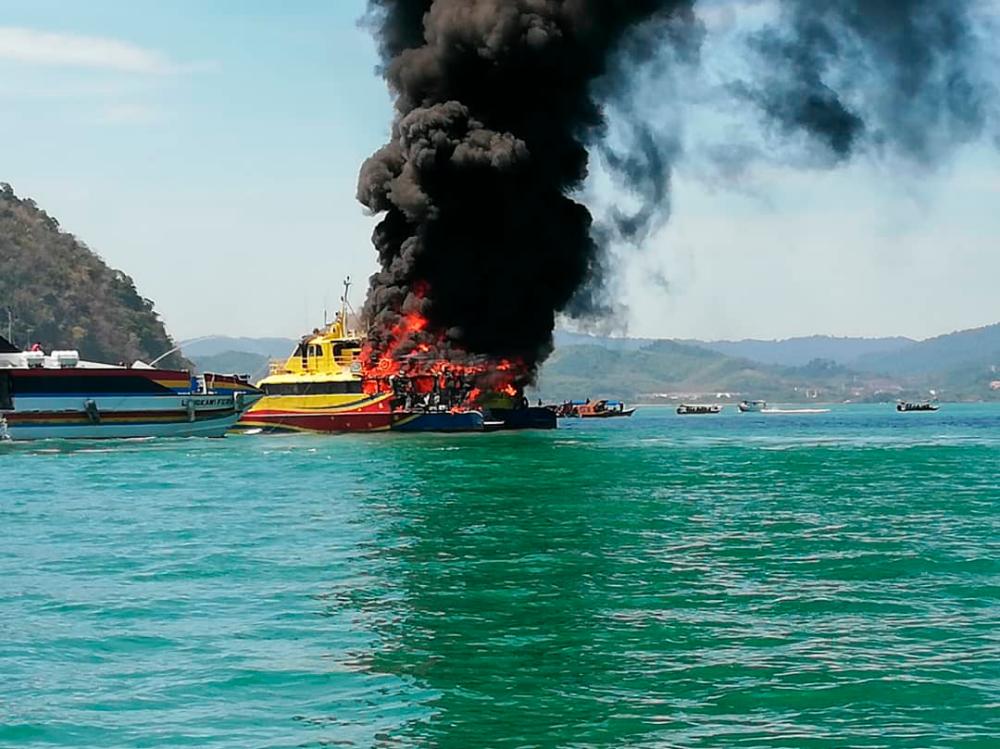 Picture of the ferry on fire.