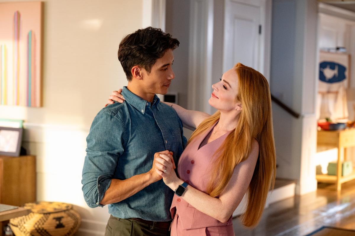 (From left) Eric (Jacinto) and Anna (Lohan) make a picture-perfect pair. - PR $!(From left) Eric (Jacinto) and Anna (Lohan) make a picture-perfect pair. - PR