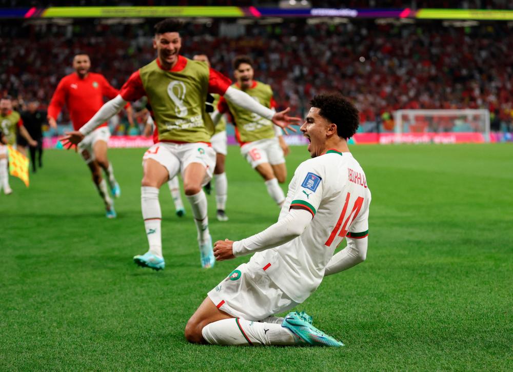 Morocco's Zakaria Aboukhlal celebrates scoring their second goal/REUTERSPIX