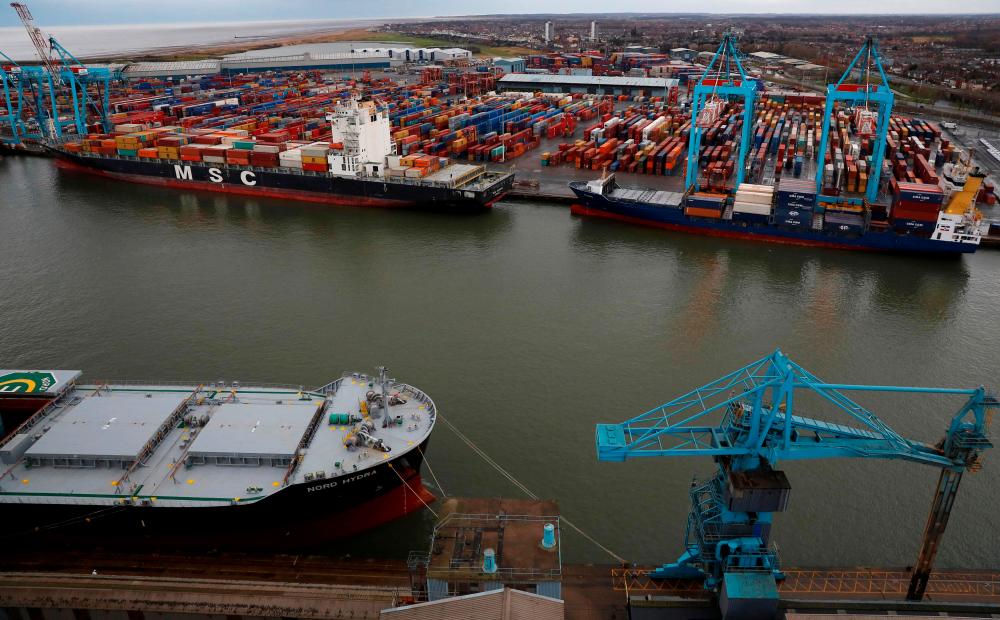 File photo of a container ship at Peel Ports Liverpool container terminal. Britain has been looking to build global trade ties following its departure from the EU in 202– Reuterspic