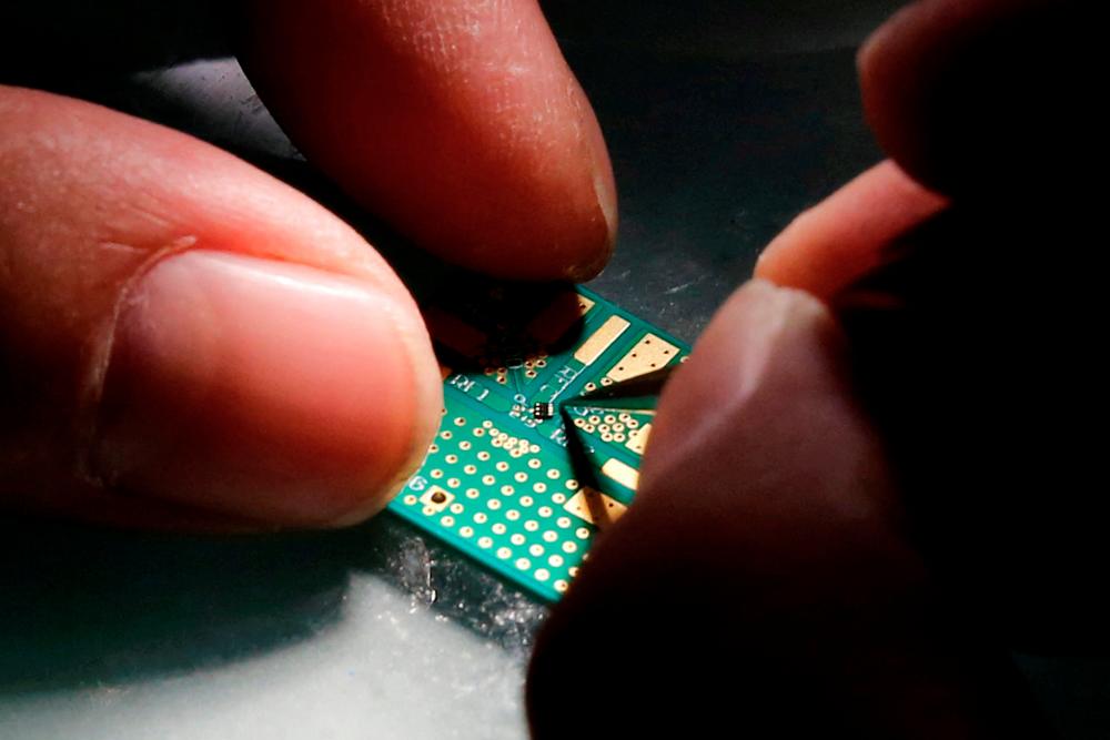 The US passed a sweeping set of regulations in October aimed at kneecapping China’s semiconductor industry, prompting a complaint from a top China trade group. – Reuterspic
