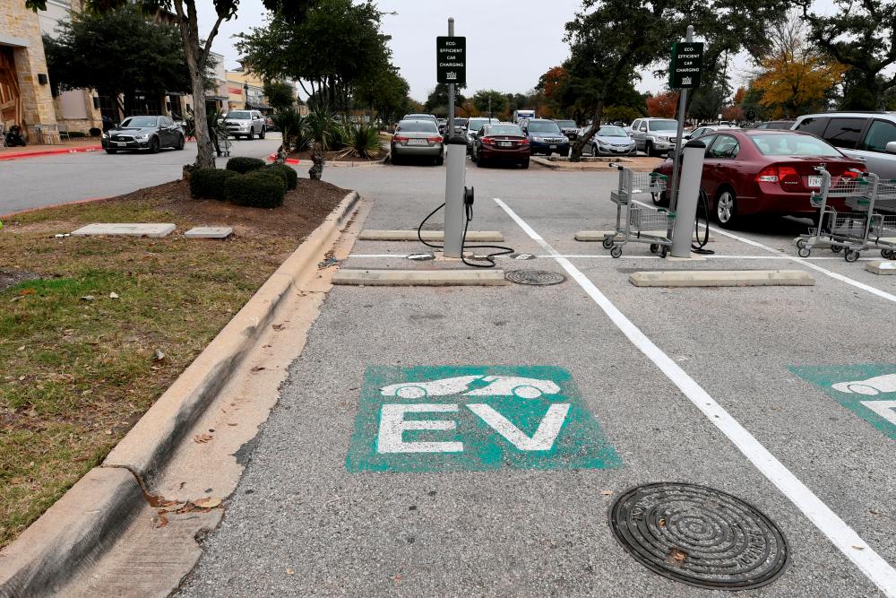 An electric vehicle fast-charging station is seen in a parking lot in Austin, Texas. The EU has concerns about a US climate law that will cut off the bloc's electric vehicles from US tax credits. – Reuterspic