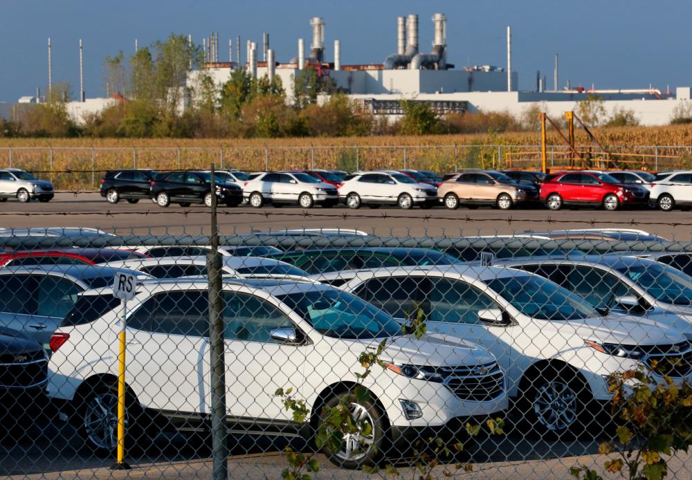 Chevrolet Equinox SUVs are parked awaiting shipment near the General Motors assembly plant in Ingersoll, Ontario, Canada, in October 2017. – REUTERSPIX